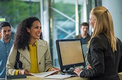 Photo of bank representative helping a customer