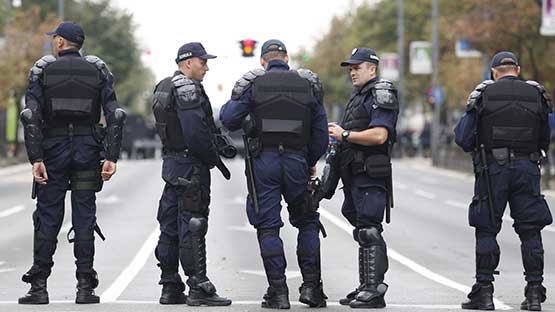 Police officers patrolling street