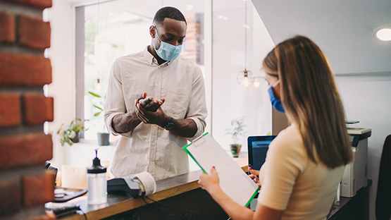 A Health Care services technician taking care of a patient.