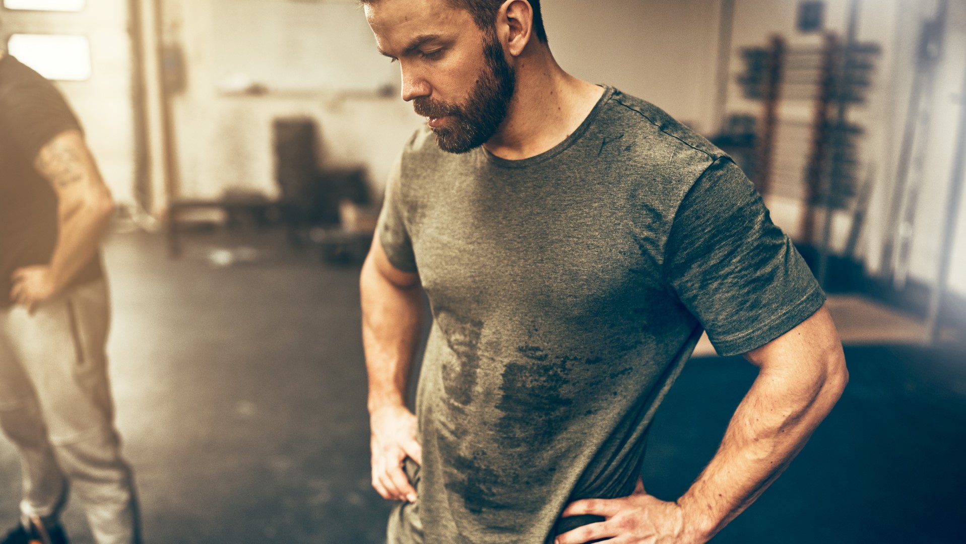 A man takes a rest during a workout set