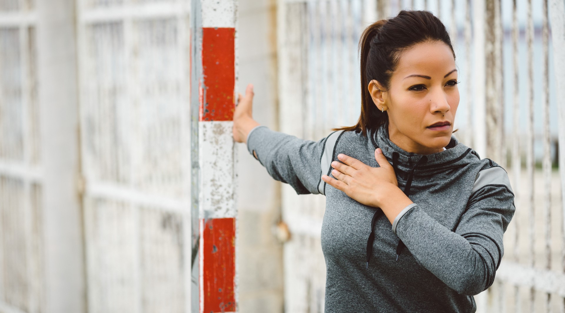 Woman demonstrates the chest opener pose