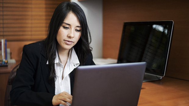 Image of woman in front of a labtop